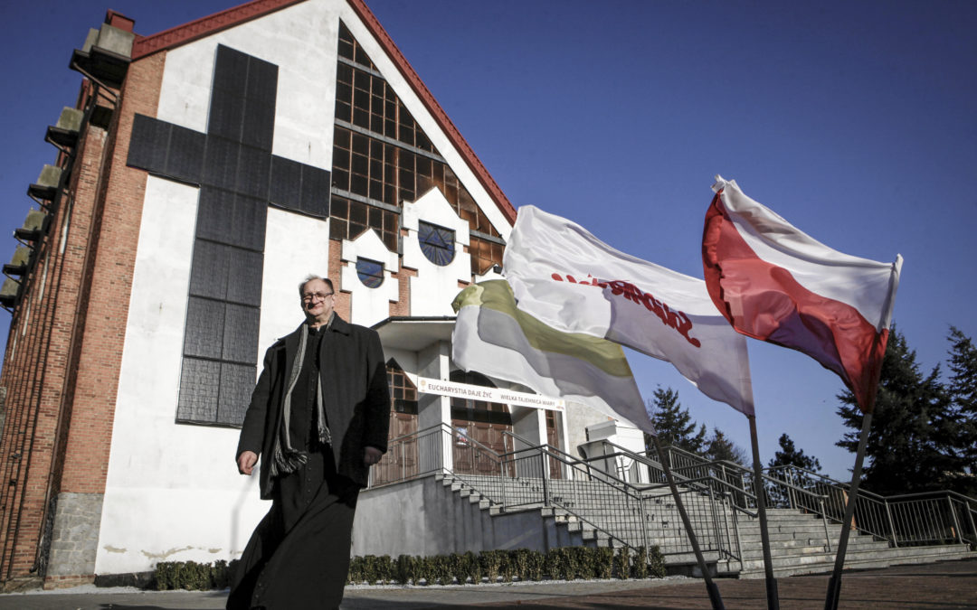 Priest installs giant solar panel cross on church in Poland