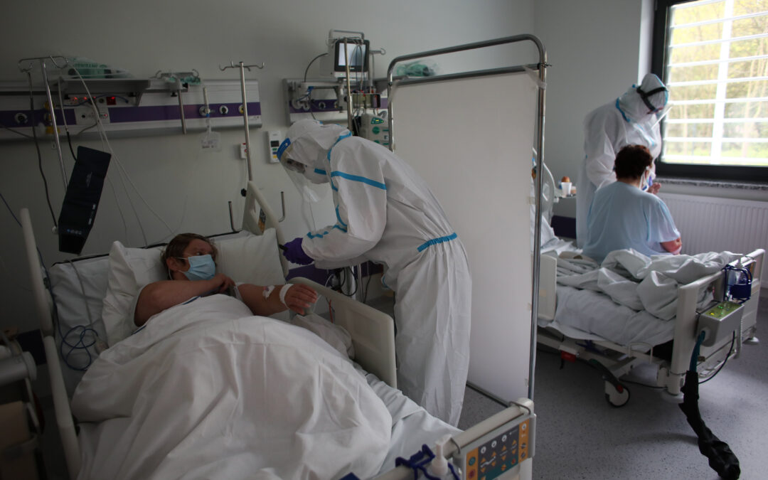 Some hospitals struggle to cope amid record coronavirus infections in Poland
