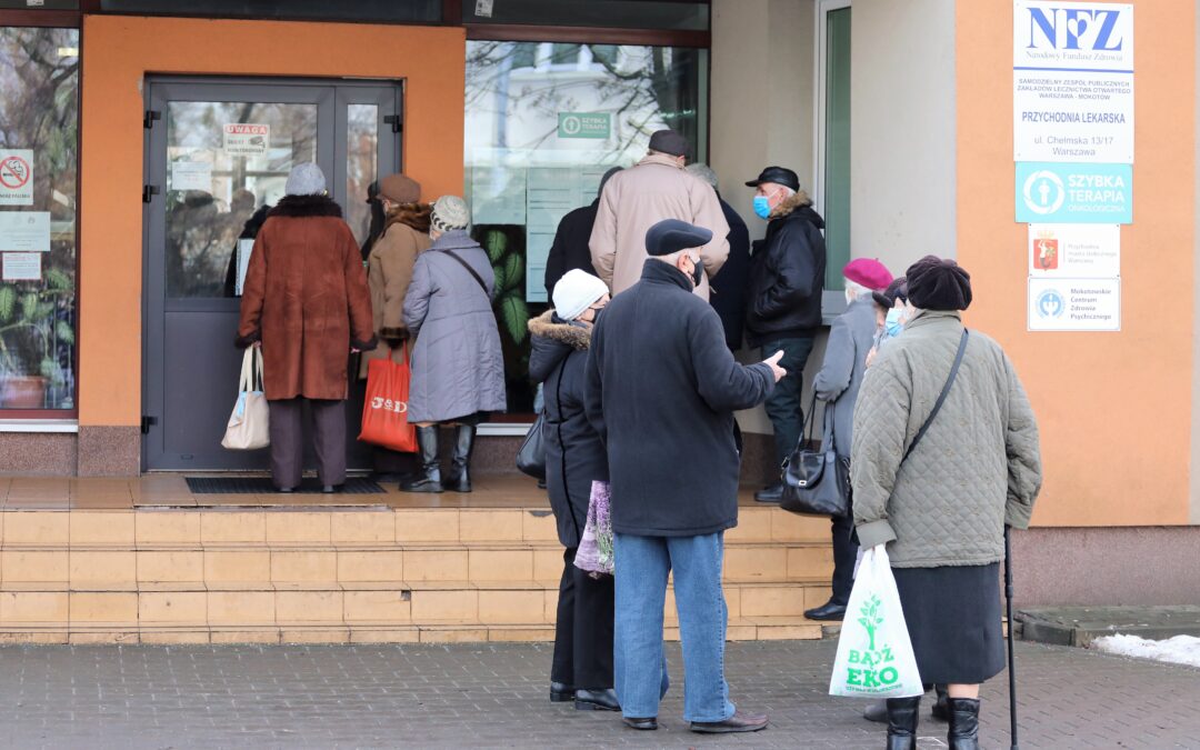 Elderly queue for vaccine registration in Poland as system hit by delays