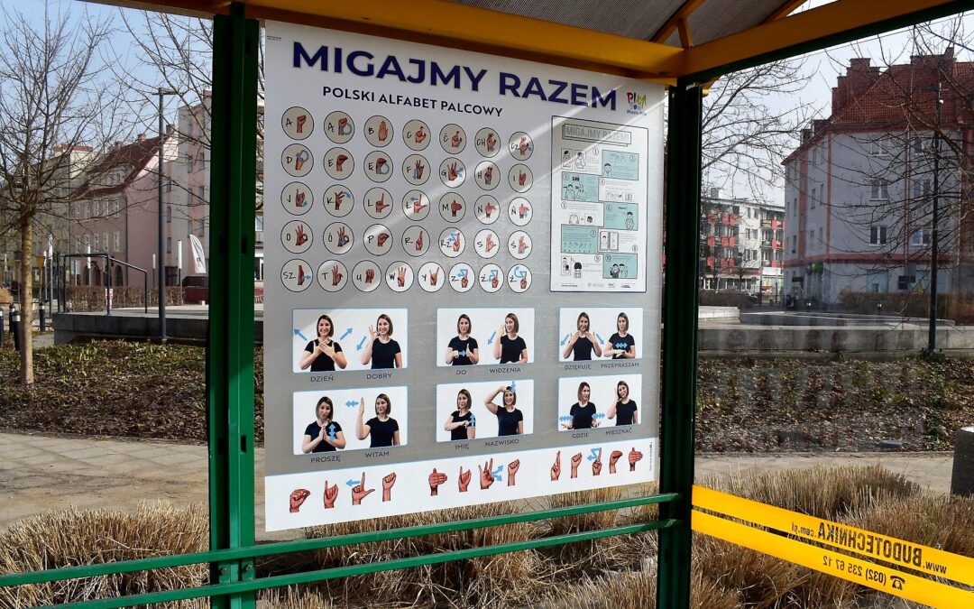 Polish town encourages learning sign language with bus stop posters