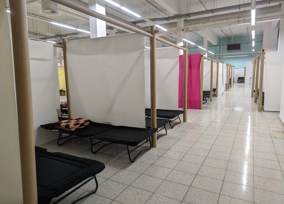 Polish city uses award-winning cubicle design at refugee shelter in former supermarket