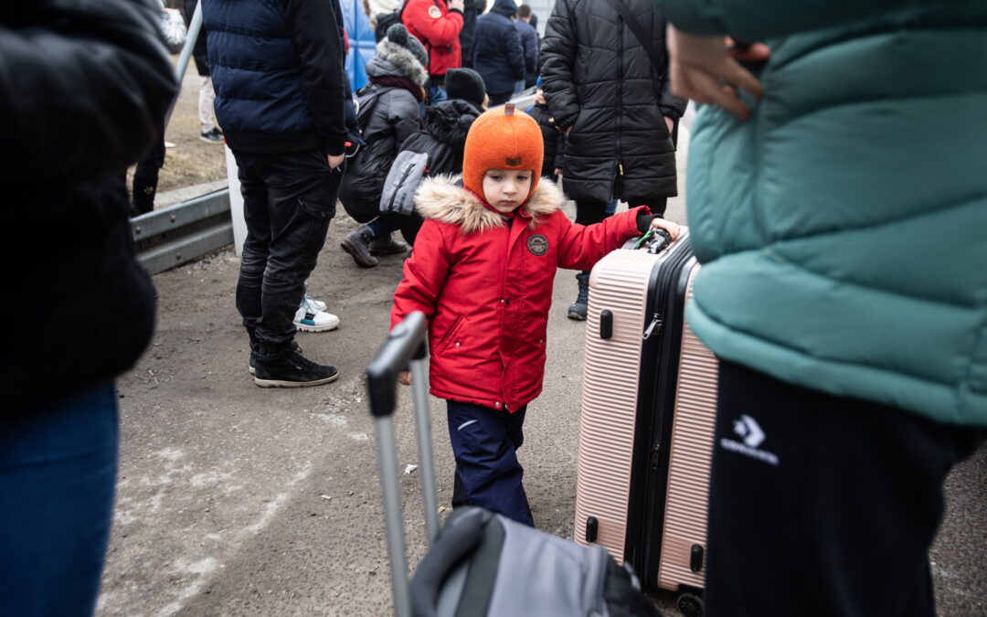 Poland pledges school places for Ukrainian children, who make up half of refugees