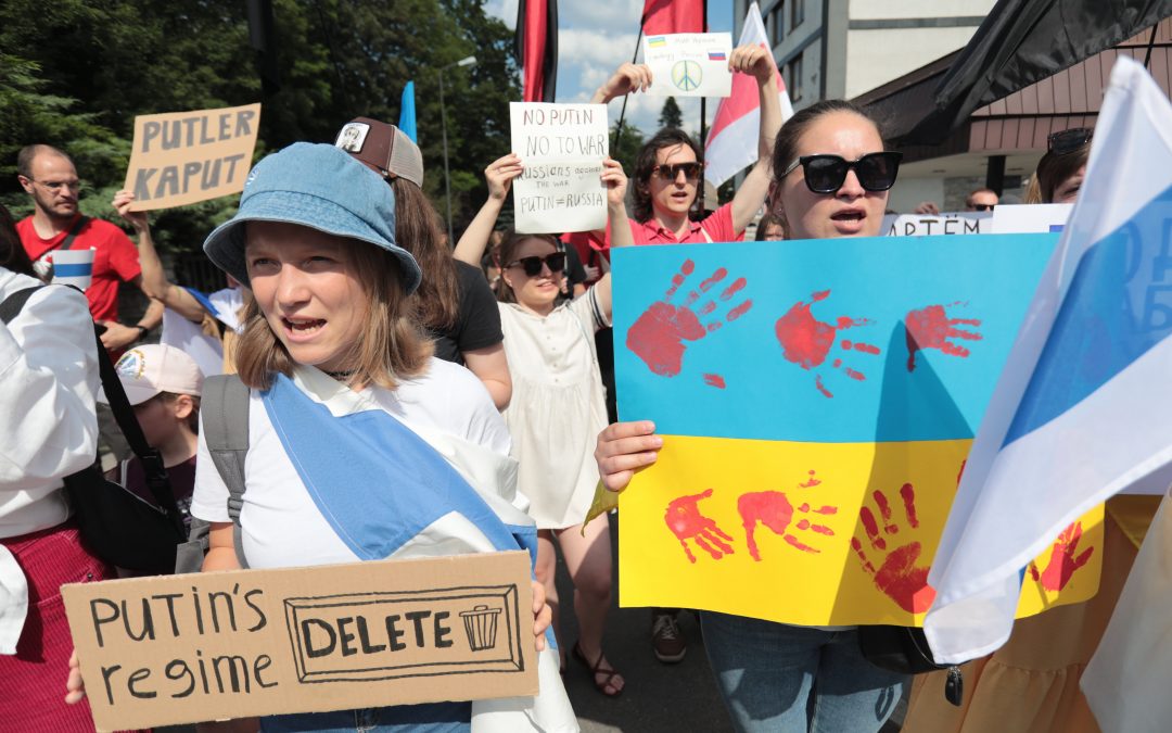 Russians in Poland protest Ukraine war outside embassy