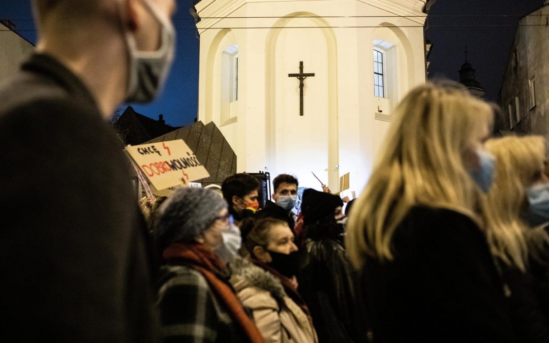 Woman convicted of offending religious feelings by throwing eggs at church in Polish abortion protest