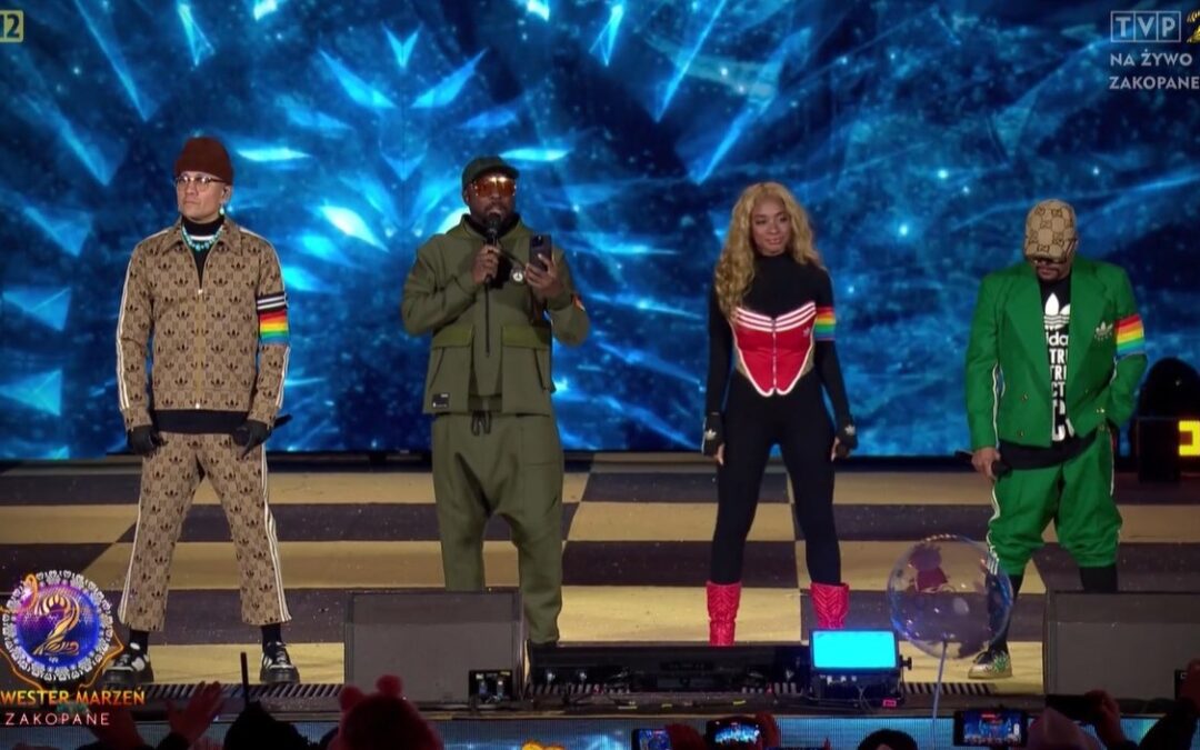 Polish government politicians condemn “disgrace” as Black Eyed Peas wear rainbow armbands during state TV concert