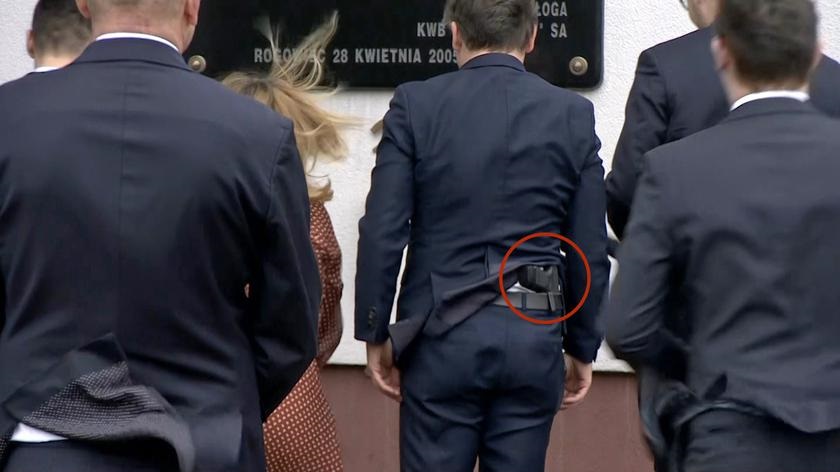 Polish justice minister explains why he was carrying gun during official duties