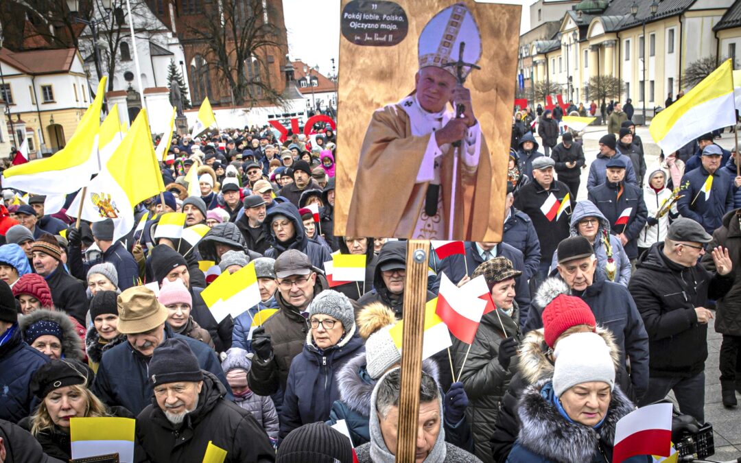 Marches in Poland defend Pope John Paul II following accusations of child sex abuse neglect