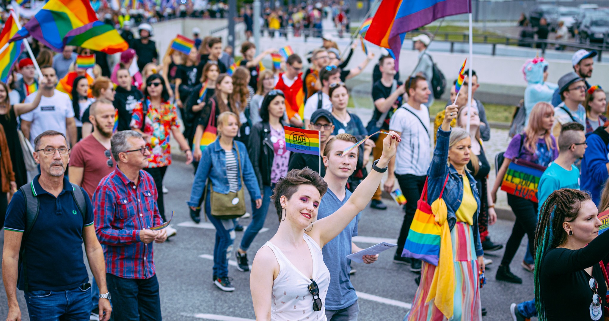 Members of Polish LGBTQ community are seen with rainbow coloured Polish  flag during the march. Annual Equality March also known as 'Pride Parade'.  Th Stock Photo - Alamy