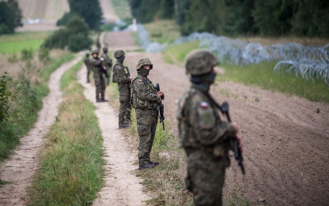 Controversy after Polish soldiers charged for firing warning shots at migrants crossing Belarus border