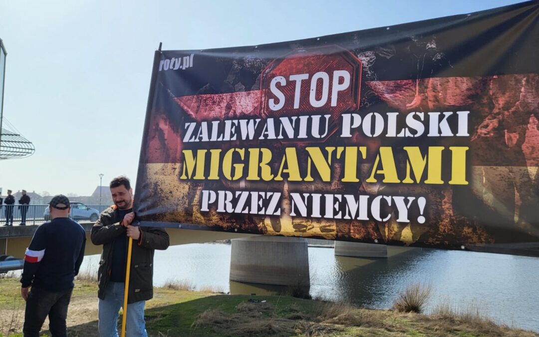 Demonstrators block border bridge in protest against “Germany flooding Poland with migrants”.