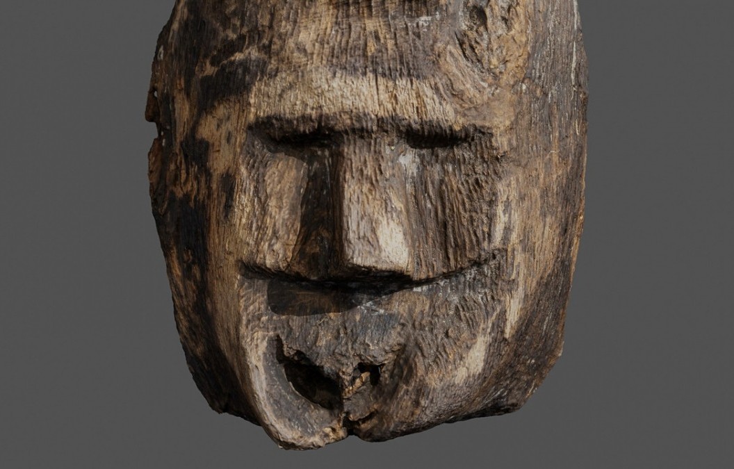 Thousand-year-old wooden face sculpture found at bottom of Polish lake