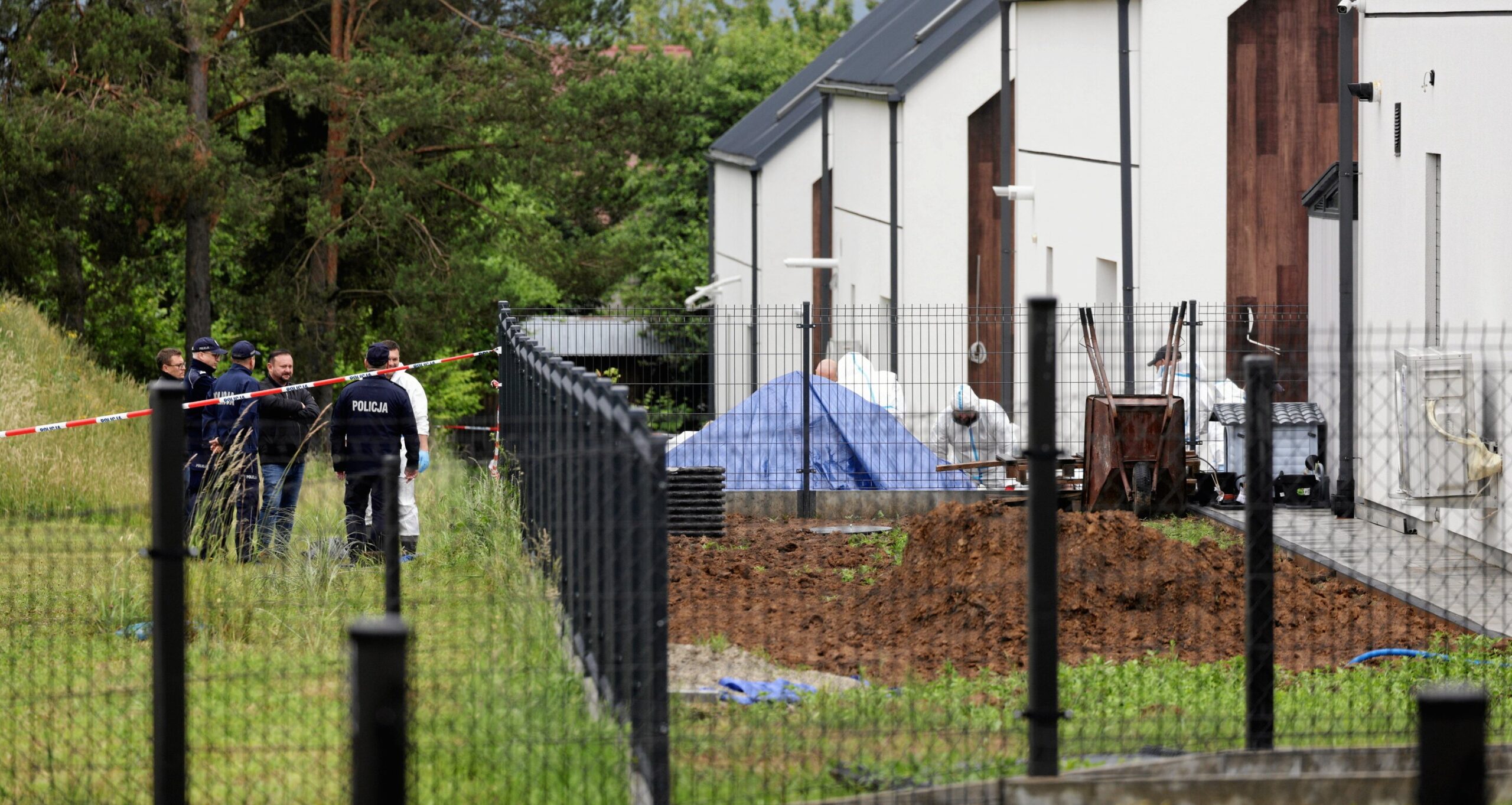 Doctor charged in Poland after 34 human foetuses found buried on her former property